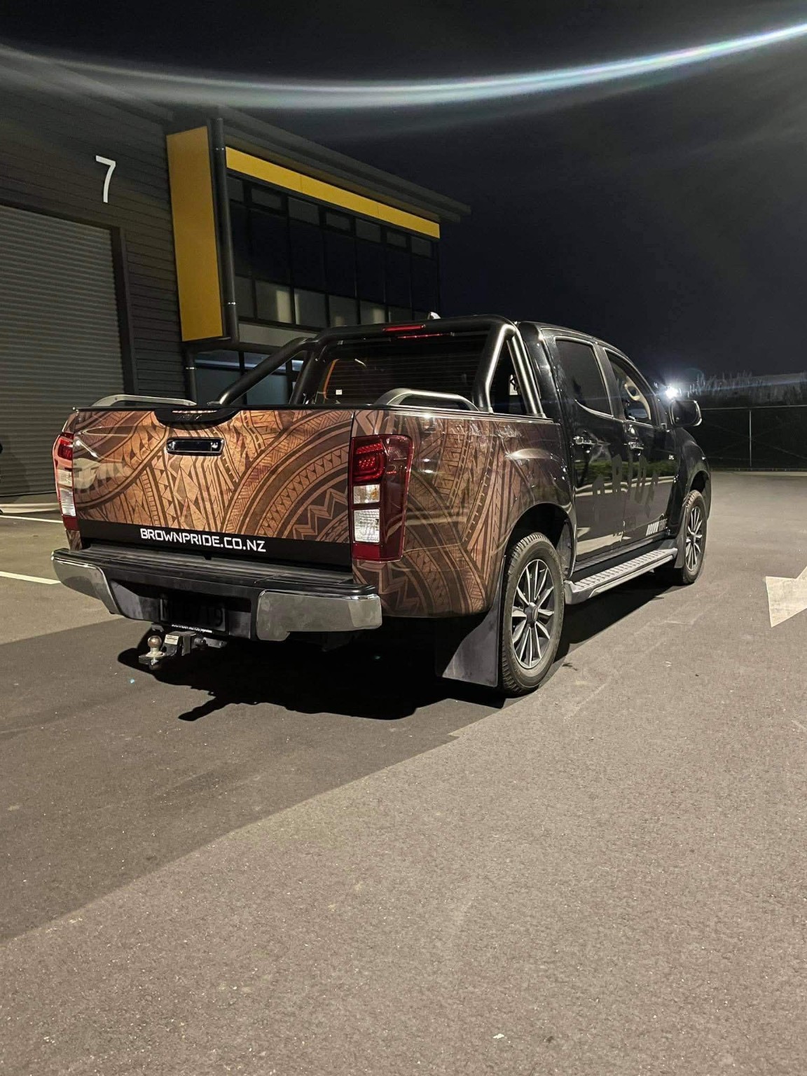 Custom vehicle branding in a dark setting